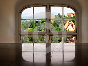 Window view of Bratislava, Slovakia. Part of the window, reflection of the window
