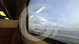 Window view from fast train in Holland