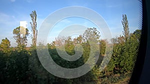 Window view of moving bus.