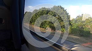 Window view of a moving bus