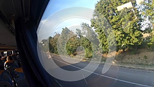 Window view of a moving bus