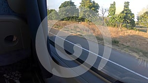 Window view of a moving bus