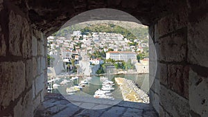 window view of old medieval harbour in Croatia