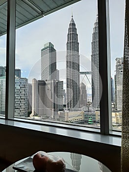Window view of petronas twin tower are most expensive view for tourist preferences