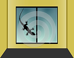 Window View.Silhouette of Lizard`s on glass window photo