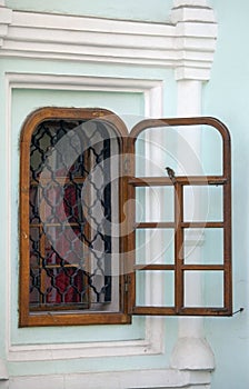 Window on the wall of cathedral.