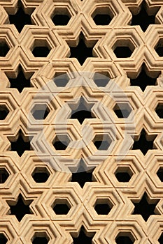 A window was decorated with geometrical patterns at Qutb minar in New Delhi (India)