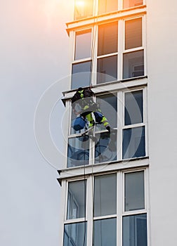 Window washers on a office building