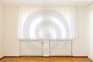 Window with white curtains