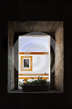 Window between window, views of the colonial city of La Antigua Guatemala.