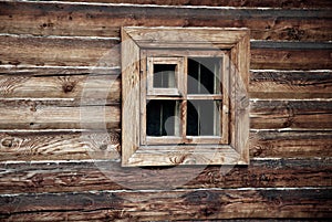 Window in wooden wall