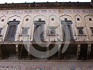 Windows of an ancient palace or haveli in Mandawa, Rajasthan, India