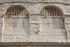 Windows in ancient stone walls.