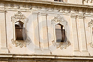 Windows with baroque decorations - Noto town Sicily Italy