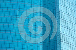 Windows of blue modern office skyscraper building. Architecture