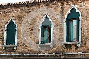 Windows and Brick Wall Facade in Murano Isle near Venice, Italy