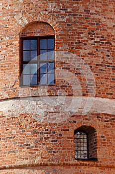 Windows in brick wall