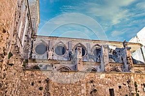 Windows and buttresses on the side of Cuenca Cathedral