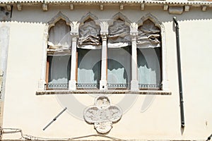 Windows with courtains in Venice