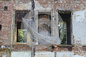 Windows of a derelict house photo