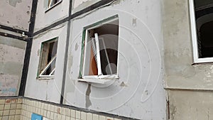 Windows of a destroyed building in Mariupol. War in Ukraine