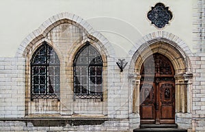 Windows and door on facade of historic building