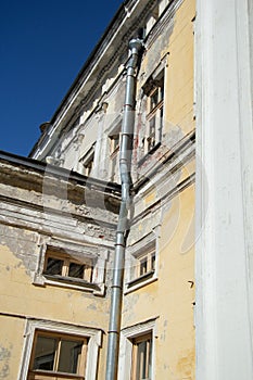 Windows and drainpipes of the old house