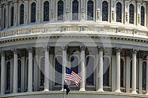 Windows and flag of the dome of the capitol of the United States of America, located in Washington DC which is the federal capital