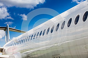 Windows and fuselage of a private airplane