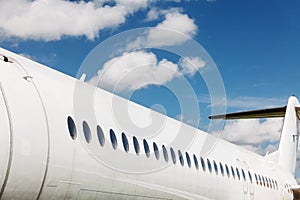 Windows and fuselage of a private airplane photo