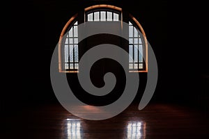 Windows light in the darkness room, dark windows background.