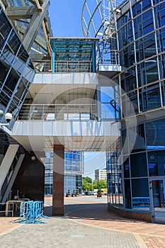 windows and metal structure on the wall of modern buildings of business centers. Background modern