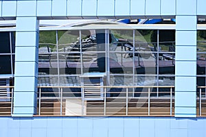 windows and metal structure on the wall of modern buildings of business centers. Background texture modern