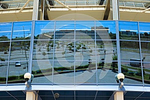 windows and metal structure on the wall of modern buildings of business centers. Background texture modern