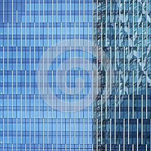 Windows on modern glass and steel skyscraper building - abstract business background