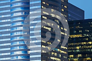 Windows of office buildings illuminated at night