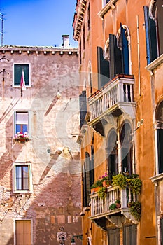 Windows on the old building in Venice canal, Italy