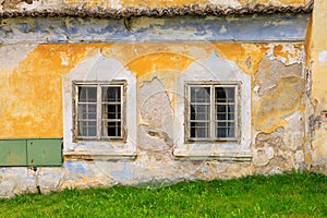 Windows of an old retro vintage classic european abandoned house. Background with selective focus