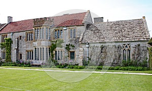 Windows and old stone walling in an English Manor House