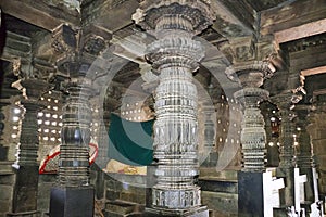 Windows and pillars, interior view of Chennakeshava shrine hall. Chennakeshava temple. Belur, Karnataka.
