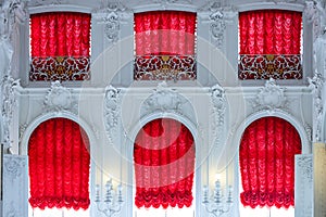 windows with red curtains