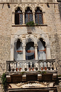 The windows of the renaissance Cipiko palace from the fifteenth century in Trogir Croatia.