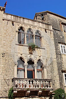 The windows of the renaissance Cipiko palace from the fifteenth century in Trogir Croatia.