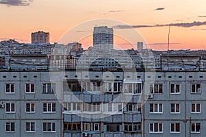 Windows, roofs and facade of an apartment building in Russia photo