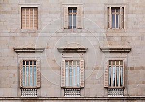Windows in row on facade of historic building