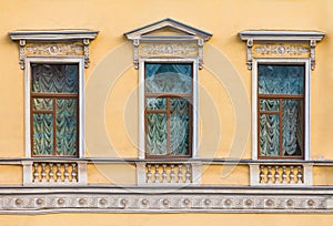 Windows in row on facade of historic building