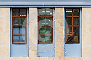 Windows in row on facade of urban building