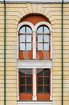 Windows in row on facade of urban building