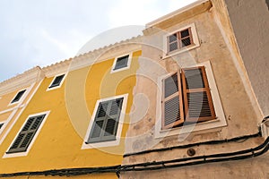 Windows shutters on buildings in old town Ciutadella, Menorca