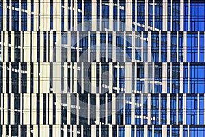 Windows of skyscraper, architecture close up. Glass and concrete. Urban Business District. Modern abstract background